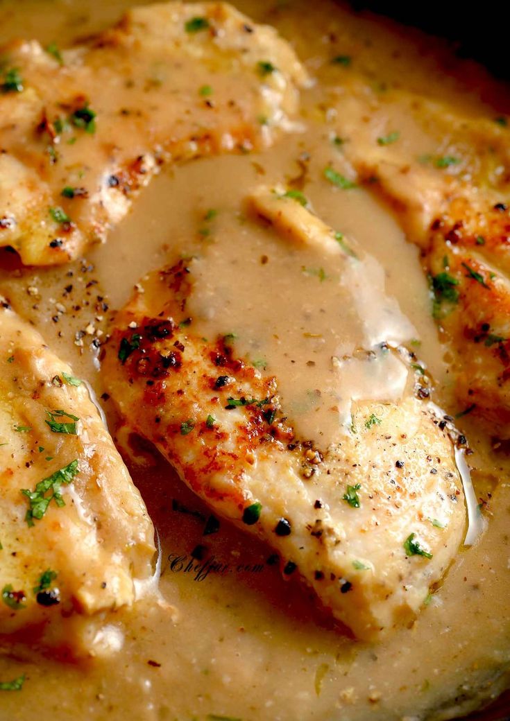 chicken with gravy in a white sauce