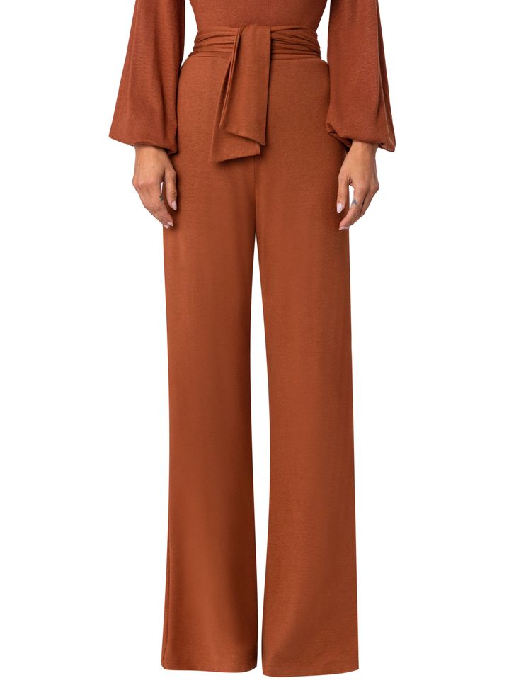 Wow the crowd in these amazing Mocha hue Belted Pants. Miss “Tawny” is a season’s must-have with her attached belt and wide leg finish. Style her with the “Renee” Mocha Duster for a perfect 10/10 look. Pant inseam: 34" (measurement taken from a size XS) Side pockets Belt attached (on each side) Stretch Knit Fabric Waist: XXS: 24", XS: 26", S: 28", M: 30", L: 32", XL: 34", XXL: 36" Model is 5'8 and wearing a size XS Dry clean only Made in Los Angeles Perfect 10, Belted Pants, Pocket Belt, Mocha, Duster Coat, Knit Fabric, Knitted Fabric, Wide Leg, Dry Clean