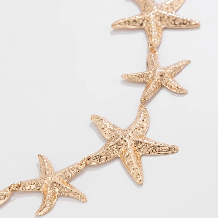 Hey beach lovers! 🌊✨ Introducing the Trendy Sea Starfish Waist Chain, a charming and stylish accessory that captures the essence of ocean vibes and summer fun. This exquisite waist chain is perfect for adding a touch of seaside allure to your beachwear or festival outfits. Why You'll Love It: Seaside Charm: Features a sea starfish design that evokes the beauty of the ocean, perfect for summer beach days. Versatile Wear: Ideal for beach parties, festivals, or simply lounging by the shore. Adds a Starfish-shaped Necklace With Starfish Charm For Summer, Beach Starfish Charm Necklace, Summer Starfish Charm Star Necklace, Starfish Charm Necklace For Beach, Ocean-inspired Starfish Necklace For Vacation, Star-shaped Necklaces For Beach Summer, Beachy Starfish Necklaces For Vacation, Beachy Starfish Necklace For Vacation, Beach Jewelry With Starfish Charm