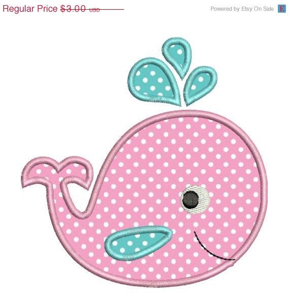 a pink whale with polka dots on it