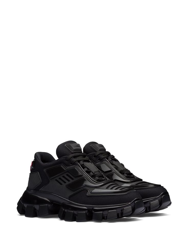 Prada Cloudbust Thunder Sneakers | Farfetch.com Luxury Black Sneakers For Sports, Luxury Black Sports Sneakers, Luxury Black High-top Sneakers For Sports, Modern Carbon Sneakers For Streetwear, Black Nylon Sneakers With Abzorb Midsole, Black High-top Sneakers With Translucent Outsole For Outdoor, Modern Black Nylon Sneakers, Black High-top Nylon Sneakers, Black Nylon Sneakers For Streetwear