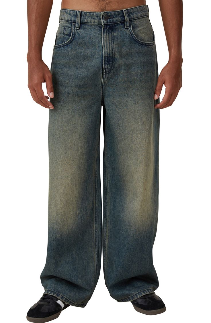 Wide, baggy legs that pool at the hems define are the on-trend nonstretch-denim jeans your wardrobe needs. Zip fly with button closure Five-pocket style 100% cotton Machine wash, line dry Imported Washed Rigid Denim Full Length Bottoms, Relaxed Fit Full Length Washed Jeans, Faded Wide Leg Rigid Denim Bottoms, Relaxed Fit Cotton Flare Jeans With Belt Loops, Streetwear Cropped Tapered Leg Jeans With Five Pockets, Relaxed Fit Rigid Denim Bottoms With Straight Hem, Baggy Cotton Flare Jeans With Frayed Hem, Streetwear Cropped Tapered-leg Jeans With Five Pockets, Baggy Flare Jeans With Frayed Hem In Cotton