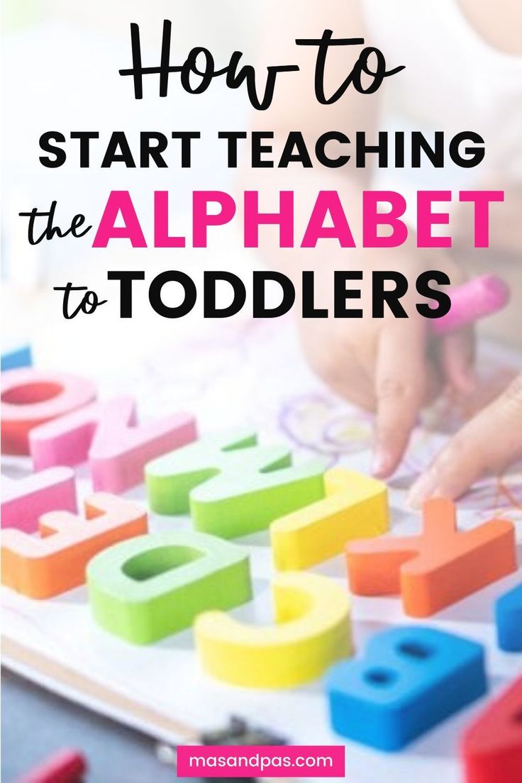 a child is playing with letters and numbers on the play mat that says, how to start teaching the alphabet to toddlers