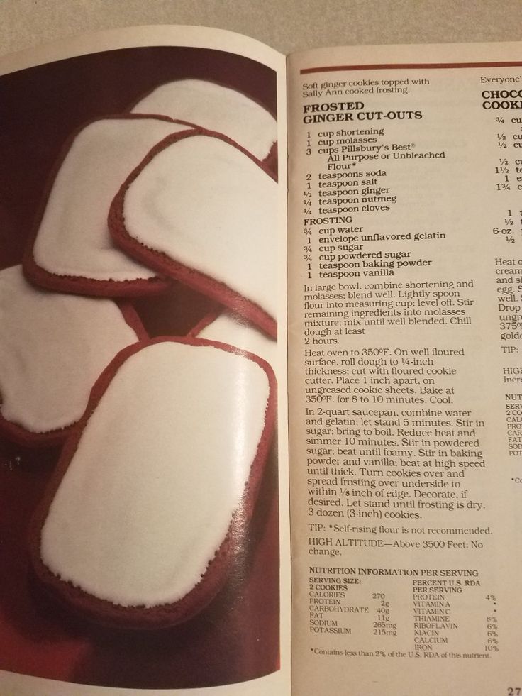 an open recipe book with cookies on it