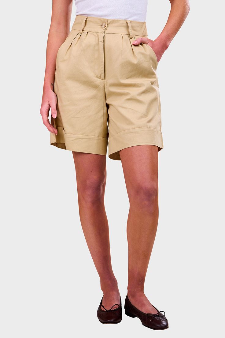 These Bleached Sand cotton twill Campania Shorts are a must have for warm weather. A classic neutral short with updated details of a cuffed hem, feminine front pleats, and relaxed wide legs aiming to sit right at your mid thigh. Pair this timeless short with the matching Delfina Vest for a perfect summer neutral look, or wear with a classic white blouse for an easy sunny day outfit.Faithfull The Brand began with a vision to inspire women around the world to live an inspired, well-travelled life Classic Relaxed Fit Bermuda Shorts For Summer, Classic Cotton Bermuda Shorts For Summer, Classic Knee-length Cotton Bermuda Shorts, Classic High-waisted Bermuda Shorts With Relaxed Fit, Classic High-waisted Bermuda Shorts, Classic Knee-length Cotton Bottoms, Classic Spring Knee-length Shorts, Knee-length Cotton Bermuda Shorts For Spring, Cotton Knee-length Bermuda Shorts For Spring