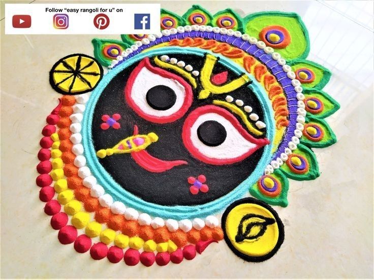 this is an image of a colorful mask on the table with other decorations around it