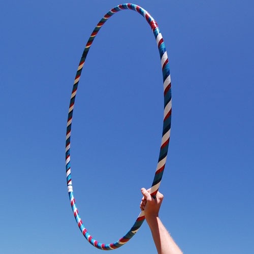 a person is holding a colorful hula hoop