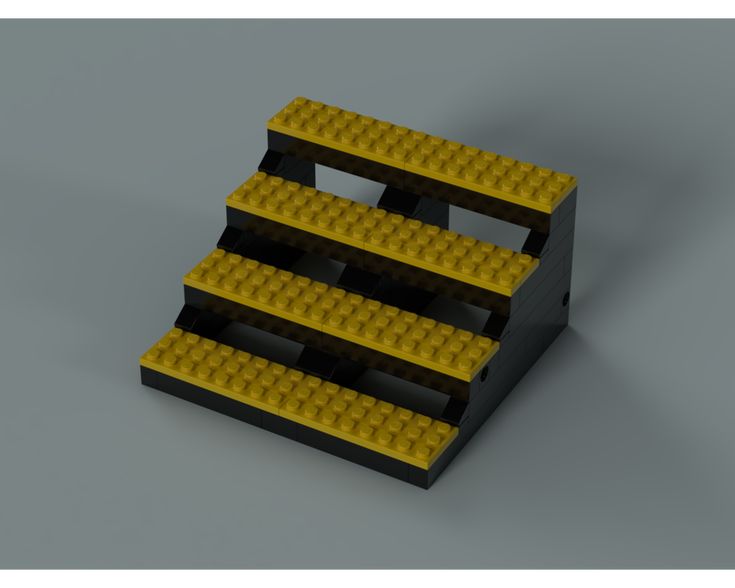 three legos stacked on top of each other with yellow bricks in the bottom tier