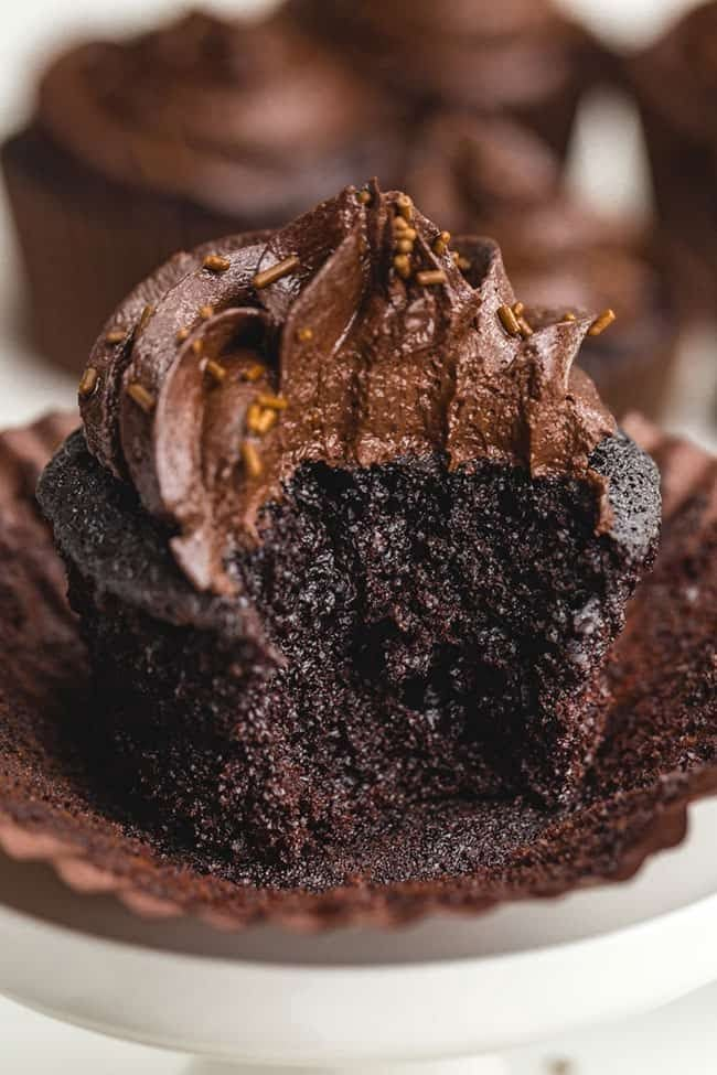 a chocolate cupcake on a white plate