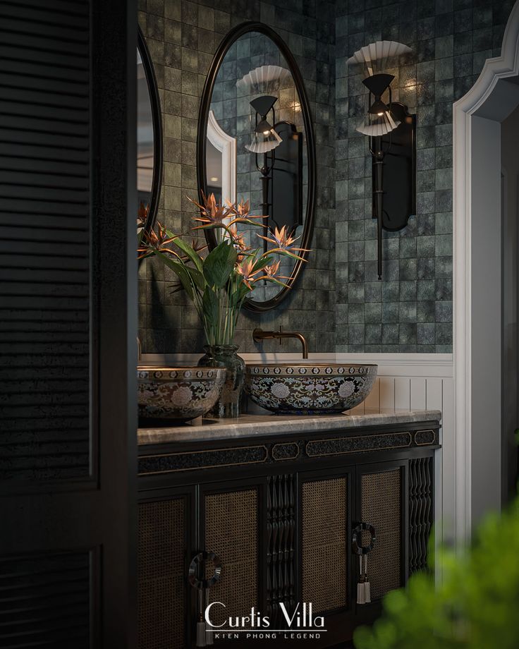 a bathroom with two sinks and mirrors on the wall