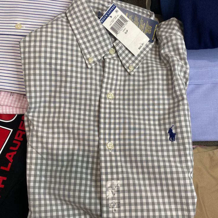 Polo Ralph Lauren Brand New With Tags Gray White Gingham Button Down Dress Shirt Long Sleeve Small Men’s Casual Collared Gingham Shirt, Casual Gingham Collared Shirt, Spring Plaid Shirt With Placket, Long Sleeve Gingham Shirt With Button Closure, Classic Gingham Cotton Top, Cotton Gingham Top With Button Closure, Spring Cotton Gingham Shirt, Spring Gingham Cotton Shirt, Long Sleeve Gingham Shirt With Buttons