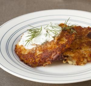 two pieces of food on a white and blue plate