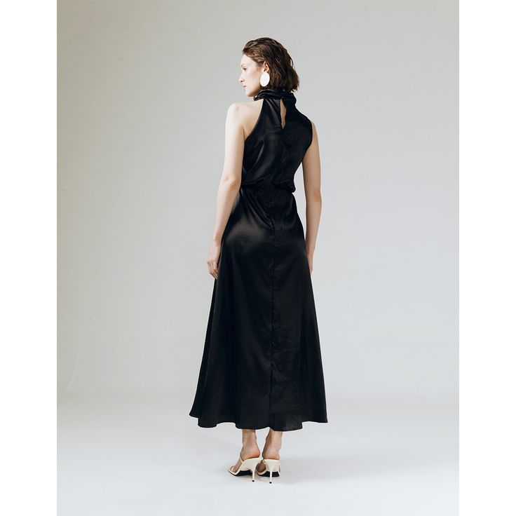 This silk midi dress ensuring a standout look with effortless elegance. Designed with an elastic waist. Perfect for any occasions- to weddings, special occasions, or any event where you want to make a statement with elegance and comfort. Hand Wash Light Ironing Do Not Bleach Chic Black Slip Dress For Wedding, Elegant Silk Tea-length Dress For Spring, Elegant Black Slip Dress For Wedding, Black Silk A-line Maxi Dress, Satin Tea-length Dress For Evening, Satin Tea Length Dress For Evening, Chic Silk Midi Dress For Wedding, Elegant Long Slip Dress For Cocktail, Chic Black Maxi Satin Dress