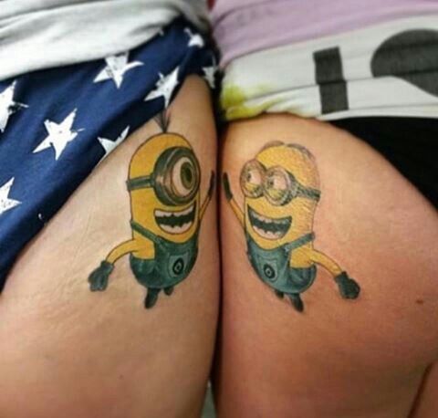 two people with minion tattoos on their butts