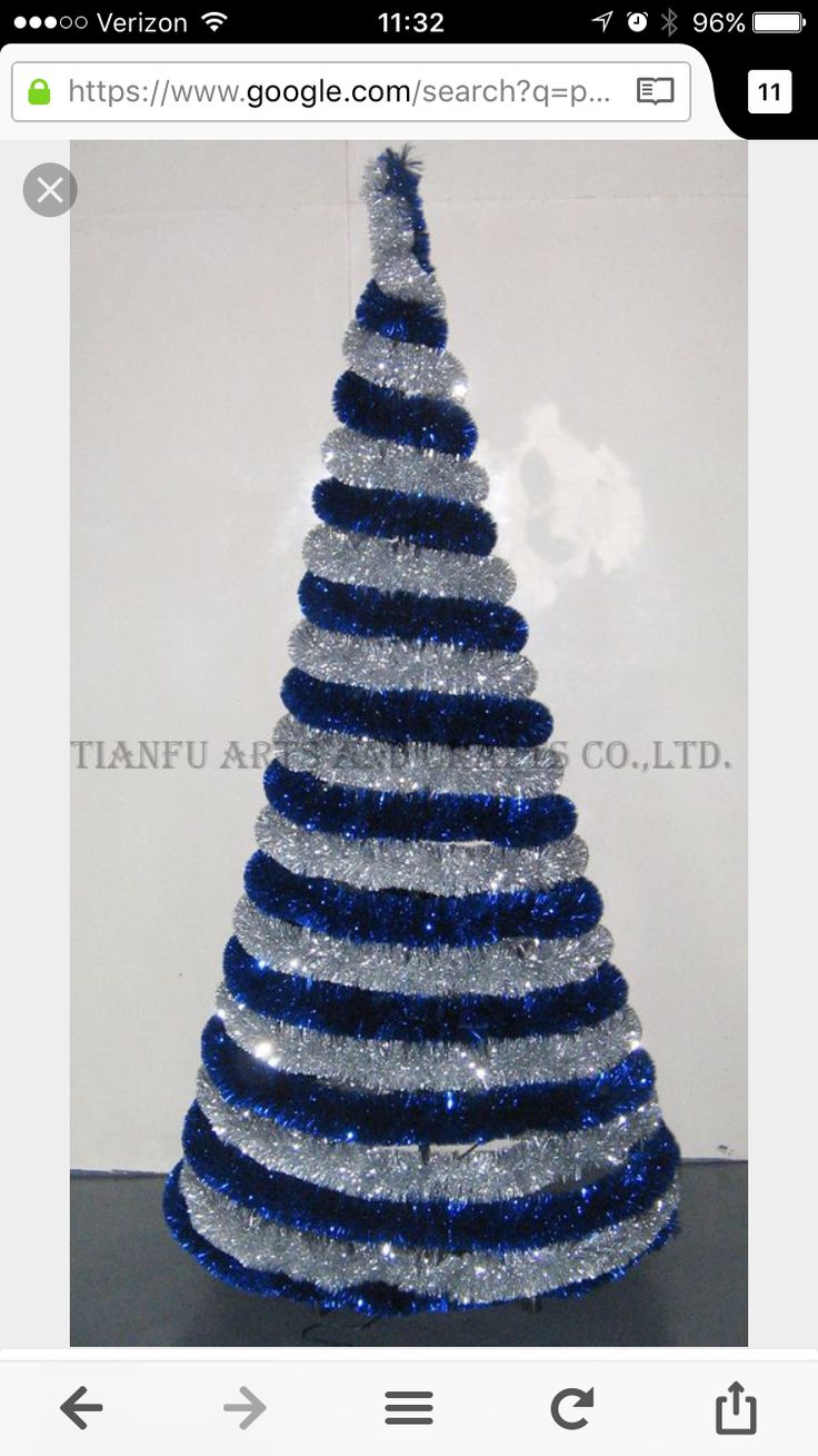 a blue and silver christmas tree on display