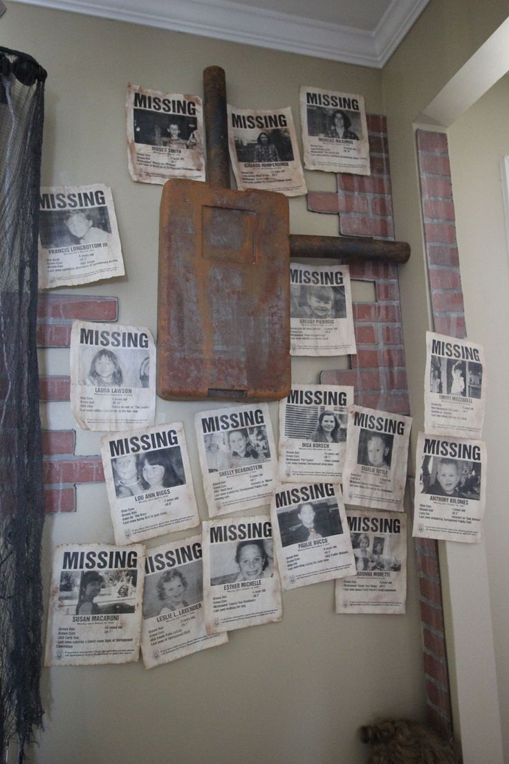 the bulletin board is covered with missing newspapers