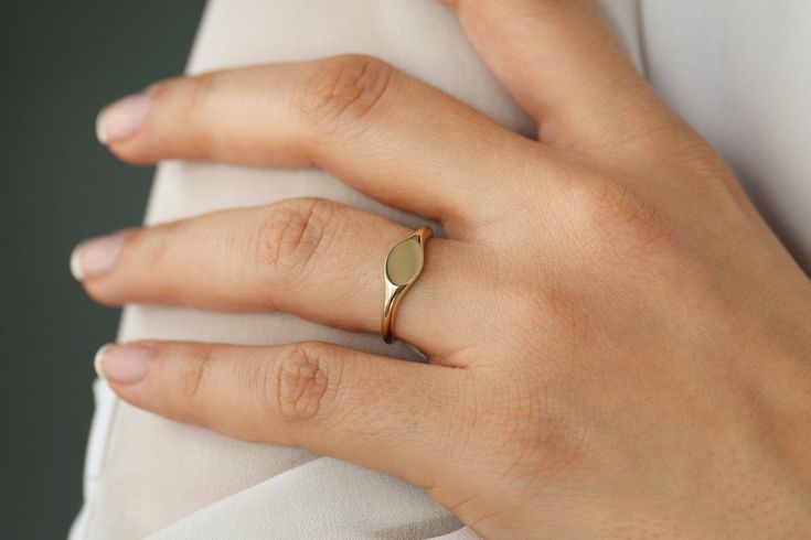 "Pinky Signet Ring / 14k Gold Oval Signet Ring / Small Signet Ring / Signet Ring Women / Minimalist Personalized Ring by Ferkos Fine Jewelry Item Details ✔ Made to Order. ✔ Gold Kt: 14K ✔ Available Gold Color: Rose Gold, Yellow Gold, White Gold ✔ Oval Signet Measurement: 8 x 6MM ✔ Height: 1.35MM ✔ Ready to Ship in 7-10 Business Days Be sure to hit \"favorite\" on the right so it remains on your favorites list and/ or add to your wishlist(s). ▶ Want to find out more? Check out my shop http://etsy Elegant Oval Stackable Rings For Everyday, Elegant Stackable Rings For Everyday, Elegant Everyday Stackable Oval Rings, Tarnish Resistant Oval Stackable Rings In Fine Jewelry, Dainty Oval Stackable Signet Ring, Oval Stackable Fine Jewelry Rings For Everyday, Oval Stackable Rings For Everyday Fine Jewelry, Everyday Oval Stackable Fine Jewelry Rings, Oval Stackable Rings For Everyday