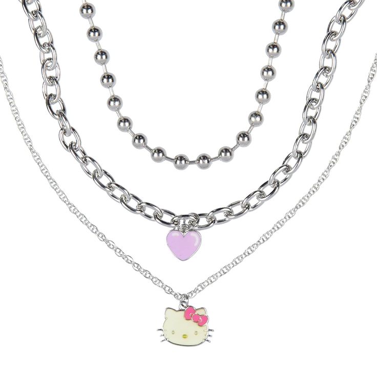 PRICES MAY VARY. THIS NECKLACE SET IS OFFICIALLY LICENSED HELLO KITTY MERCHANDISE - Bioworld is the industry leader in pop culture products and apparel that deal with the entertainment industry in comic books, tv shows, movies, music, sports, and what's trending. MATERIAL - This necklace set is designed to last and is made of a metal alloy. The pendants have a lacquer-colored designs 3 INDIVIDUAL NECKLACES - The set comes with 1 large chain link necklace, 1 thin chain link necklace, and 1 shotbe Necklace Set Silver, Hello Kitty Gifts, Hello Kitty Merchandise, Pink Hair Bows, Hello Kitty Accessories, Cat Pendants, Charm Pendant Necklace, Cat Necklace, Stone Heart