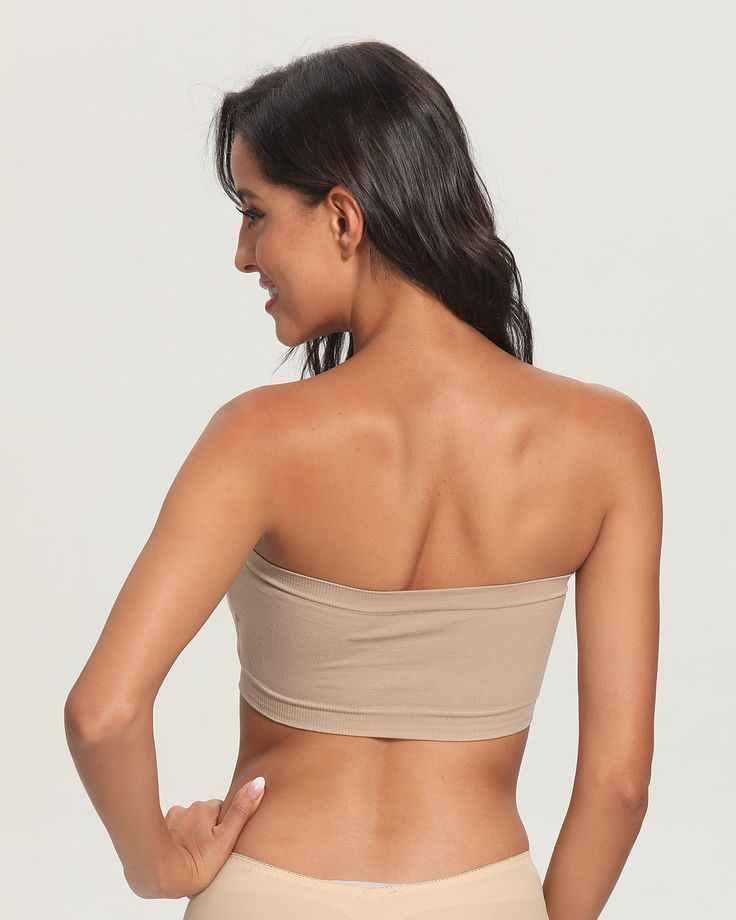 Description All Match Bandeau Bra Stylish and comfortable, our bandeau bra is a wardrobe staple. Perfect for strapless tops and dresses, this padded bandeau bra provides both comfort and support. The seamless ribbed elastic band on the top and bottom ensures the bra stays in place, so you don’t have to worry about slipping or falling down. Wire, seam, and tag-free, this strapless bra will feel comfortable all day long – you can even sleep in it. Details Nylon/Spandex blend Stylish bandeau style Seamless Strapless Tube Top For Summer, Strapless Seamless Tube Top For Summer, Versatile Tube Top, Solid Stretch Strapless Tube Top, Stretch Solid Color Strapless Tube Top, Seamless Solid Bandeau Bra, Stretch Bandeau Tube Top With Medium Bust Support, Fitted Seamless Strapless Tube Top, Fitted Bandeau Tube Top With Adjustable Straps