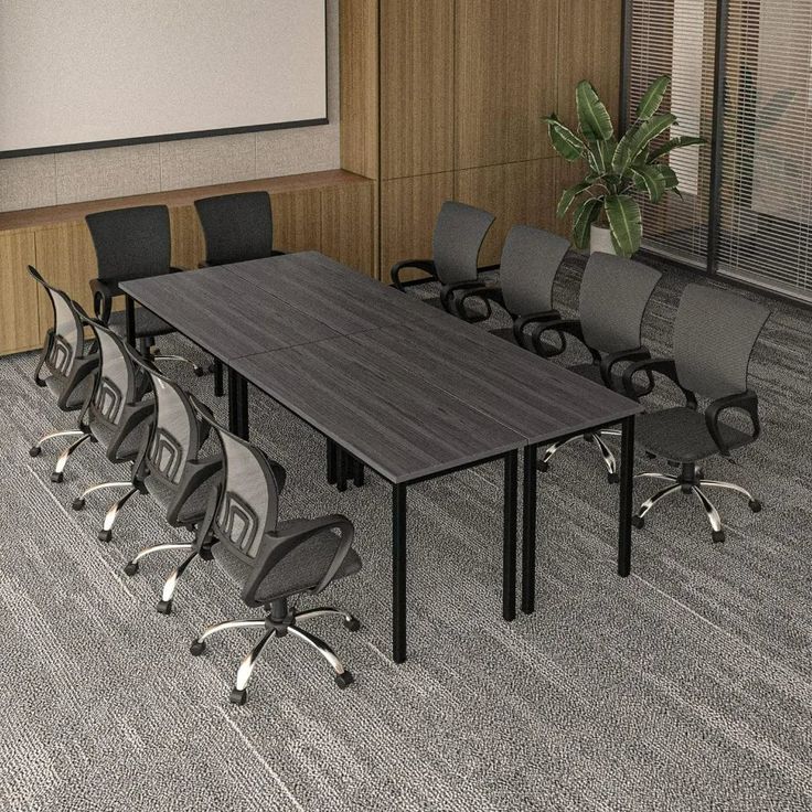 an empty conference room with chairs and a projector screen