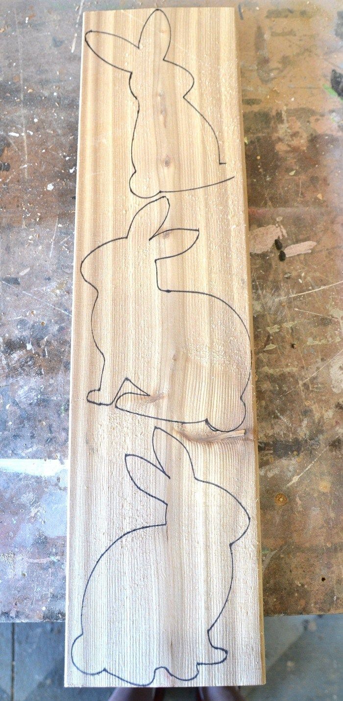 a piece of wood with some drawings on it