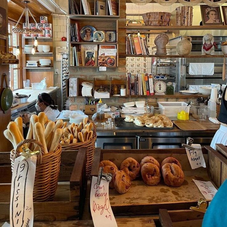 there are many different types of breads in the kitchen and on display at this store