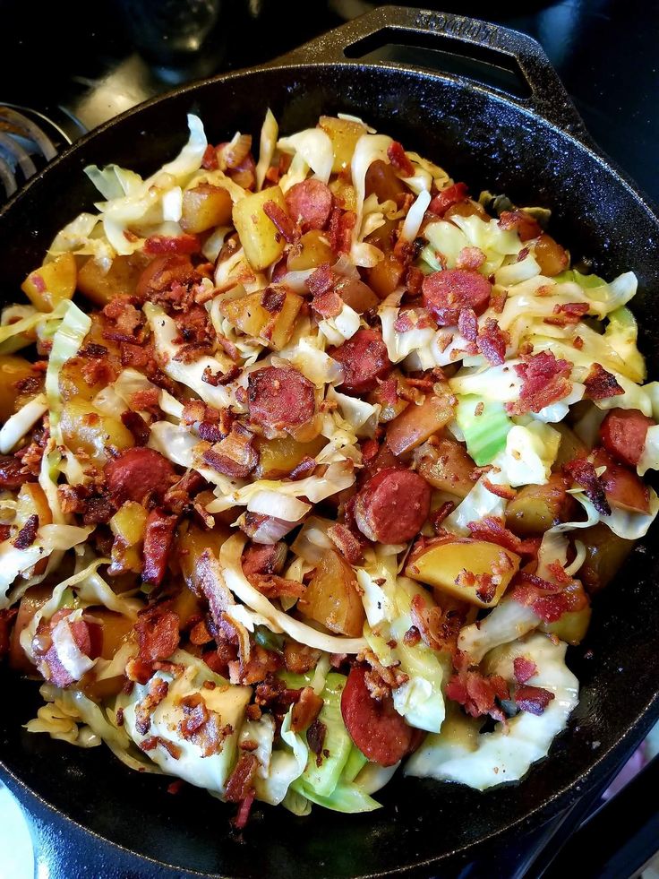 a pan filled with lots of food on top of a stove