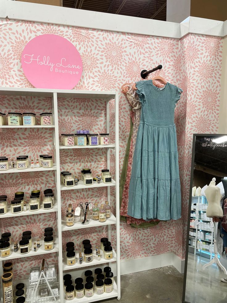 a display in a store with clothing and cosmetics