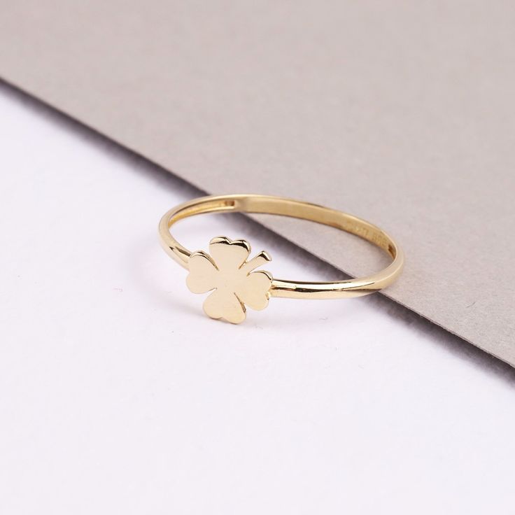 "ABOUT PRODUCT This 14K Yellow Gold Four Leaf Clover Ring is suitable gift for girlfriend, mom and her. You can even buy as a birthday gift for your friends or anniversary gifts, If you want to add a special note we can write for you and put to inside of package. We manufacture our jewelry pieces with carefully and after production we double checking in quality control department. Our main idea is keep our items for daily wearing especially for minimalist jewelry pieces. 14K Yellow Gold Four Lea Fine Jewelry White Gold Butterfly Ring For Gift, Fine Jewelry White Gold Butterfly Ring As Gift, White Gold 14k Gold Ring As Gift, 14k Stamped Fine Jewelry Ring As Gift, 14k Gold Fine Jewelry Stackable Rings Gift, Mother's Day White Gold Rings Gift, Dainty Hallmarked Rings For Gift, Mother's Day Gift Rings In Fine Jewelry Style, Mother's Day Fine Jewelry Rings As Gift