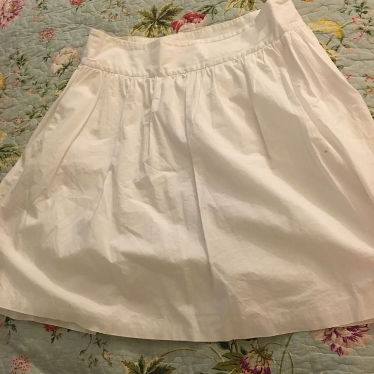 This Set In Waist And Gathered Skirt Is Bright White And All Cotton With A Full Lining In Cotton And Polyester! A Five Inch Invisible Zipper On The Left Side. Waist Approximately 15” Length 22” Casual A-line Skirt For Daywear, Flowy Cotton Tennis Skirt For Spring, Full Tennis Skirt For Summer, Spring Cotton Skort Full Skirt, Summer Cotton Skort With Full Skirt, Summer Cotton Full Skirt Skort, Full Cotton Skort For Spring, Cotton Full Skirt Skort For Summer, Cotton Tiered Tennis Skirt With Lining