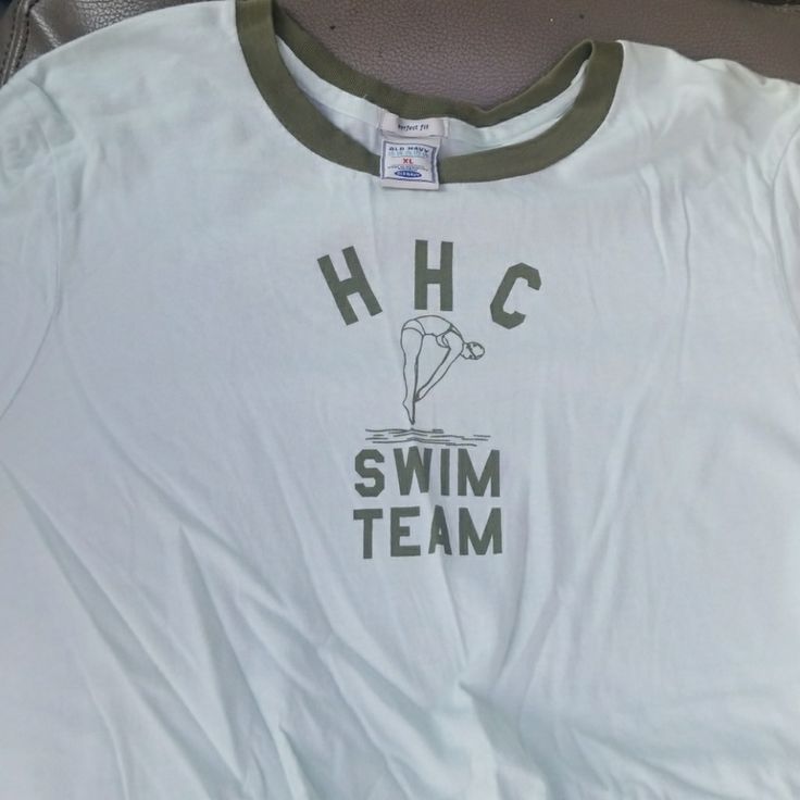 a t - shirt that says hhc swim team on it