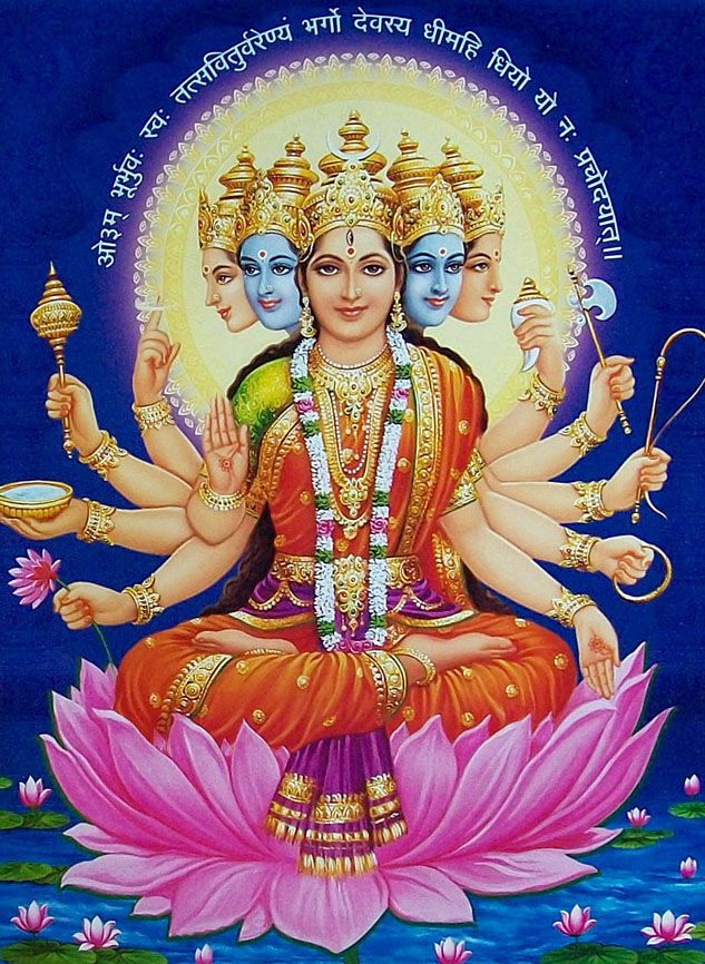 the hindu goddess sitting on top of a lotus