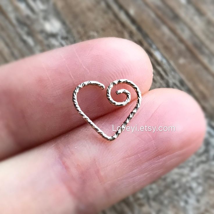 ♥Simply♥Dainty♥Everyday♥Minimal♥ 14k gold filled heart Heart size: about 11x10mm ---------------------------------------------------------- 14k gold filled Anyone who can wear gold can wear gold filled without worries of any allergic reaction to the jewelry. Gold filled jewelry is an economical alternative to solid gold! ---------------------------------------------------------- 100% handmade with -------------------------------------------------------------------------------------- IF YOU HAVE Dainty Nickel-free Huggie Nose Rings, Dainty Hypoallergenic Nose Rings For Gifts, Dainty Nickel-free Nose Rings For Everyday Wear, Dainty Sterling Silver Pierced Nose Rings, Dainty Sterling Silver Nose Rings, Dainty Sterling Silver Nose Rings For Everyday, Dainty Sterling Silver Everyday Nose Rings, Dainty Nickel-free Cartilage Earrings For Anniversary, Helix Jewelry