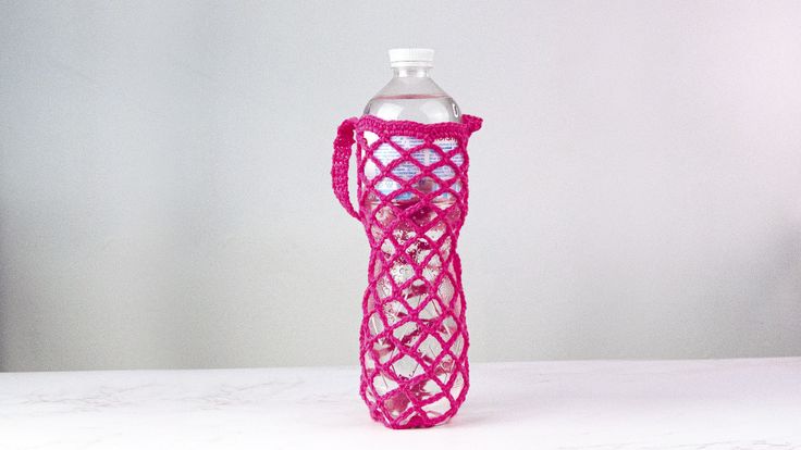 Crochet water bottle holder pattern free Crochet Trends, Crochet Water Bottle, Crochet Water Bottle Holder, Stylish Water Bottles, Bottle Sling, Bottle Cozies, Bottle Covers, Water Bottle Bag, Water Bottle Covers