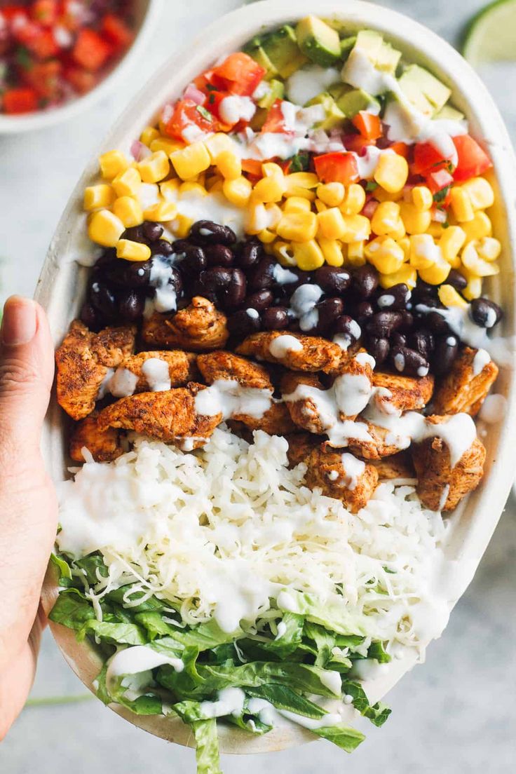 chicken burrito bowls with black beans, corn and coleslaw