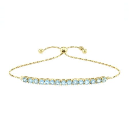 Brilliance Fine Jewelry Women's 14K Gold Plated .925 Sterling Silver Swiss Blue Topaz Tennis Bolo Bracelet. The bracelet sets with 3.5mm round blue topaz and measures at 9.7" with Bolo mechanism fitting different wrist size for everyday wear. Easy to put on or take off. Size: one size.  Color: Yellow.  Gender: female.  Age Group: adult. Bracelet Sets, Bolo Bracelet, Swiss Blue Topaz, Bracelet Set, Womens Bracelets, Blue Topaz, Gender Female, Womens Watches, Topaz