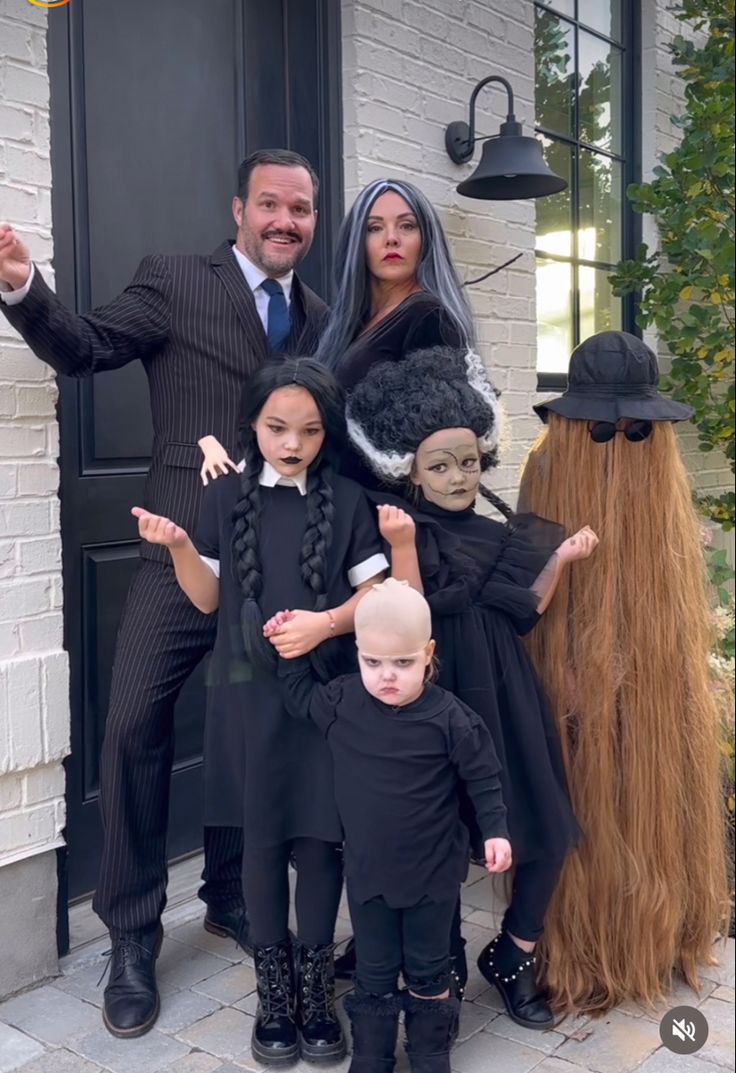 the family is dressed up for halloween