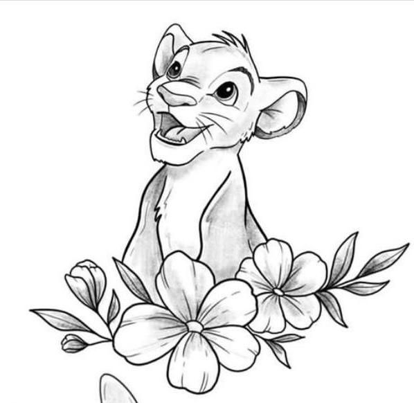 the lion cub with flowers on it's chest is shown in black and white