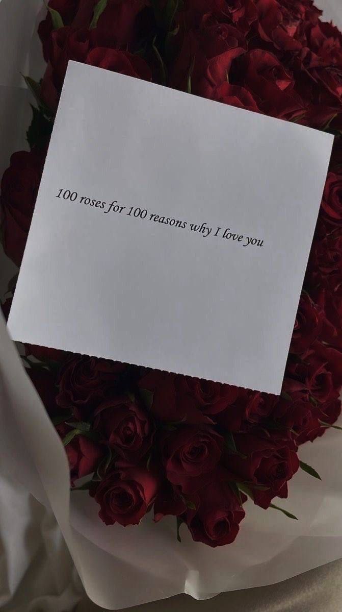 a bouquet of red roses with a note that says 100 days for 40 minutes only i love you