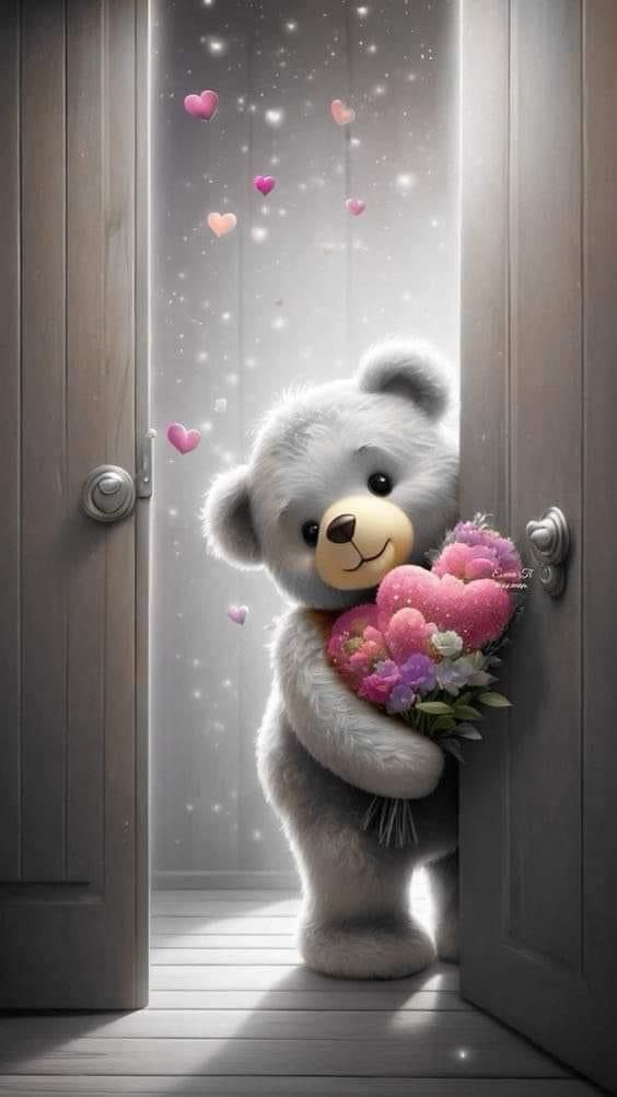 a teddy bear holding a bouquet of flowers in front of an open door with hearts