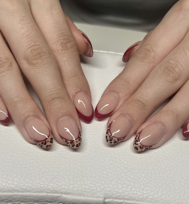 Cute Acrylic Nails Almond Shape Designs, Leporad Nail Designs, Leopard French Nails Almond, Simple Nails For Autumn, Burgundy Nails With Cheetah Print, Maroon Leopard Nails, Red Nails And Cheetah Print, November Nails Maroon, Very Simple Nail Ideas