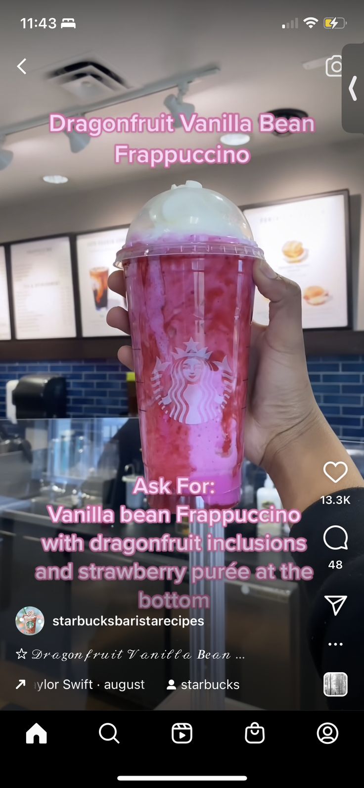 a person holding up a pink drink in front of a window with the caption dragon fruit vanilla bean frappuccino