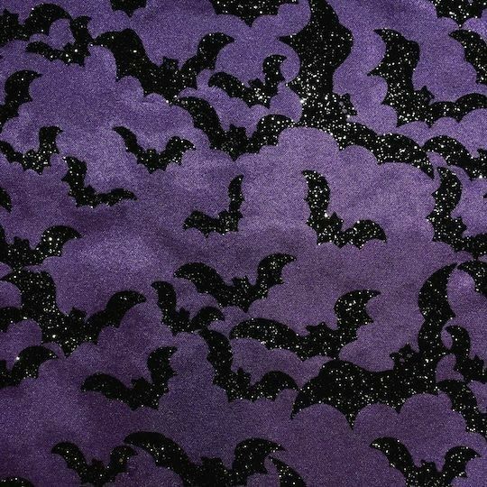 purple and black bat print fabric with sequins