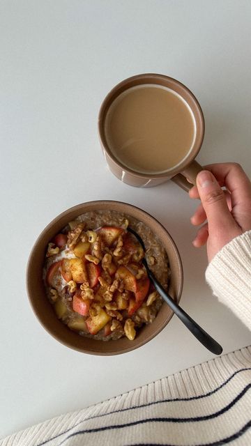 a bowl of oatmeal and a cup of coffee