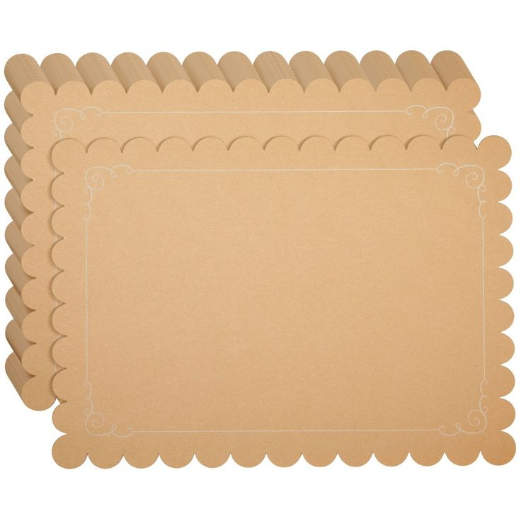 three pieces of cardboard with scalloped edges