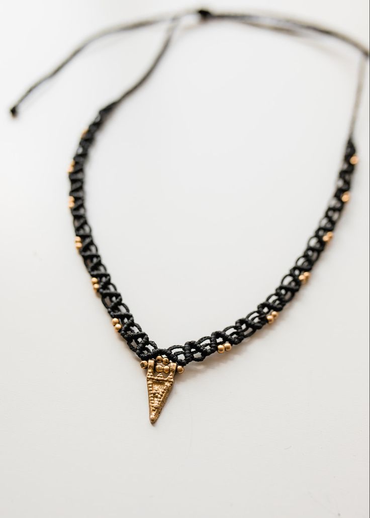 A one of a kind choker, beaded with small brass beads and a simple triangle pendant. #simplybeautiful Adjustable Triangular Beaded Jewelry, Adjustable Triangle Beaded Jewelry, Adjustable Triangle Jewelry For Everyday, Everyday Macrame Jewelry With Waxed Cord, Macrame Necklaces, Brass Beads, Triangle Pendant, Macrame Necklace, Macrame Jewelry