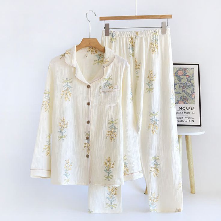 Slip into our lapel long sleeves pajama set for a blend of style and comfort. Its sophisticated beige base with charming floral patterns and pure cotton fabric offers breathability and an elegant drape. Home Clothes, Women's Sleepwear, Life Aesthetic, Elegant Drapes, Shopping Ideas, Long Sleeve Pyjamas, Casual Style Outfits, Floral Patterns, Sleepwear Women