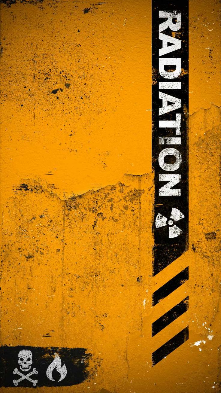 an old yellow and black sign with the words radiation on it's side, next to a skull