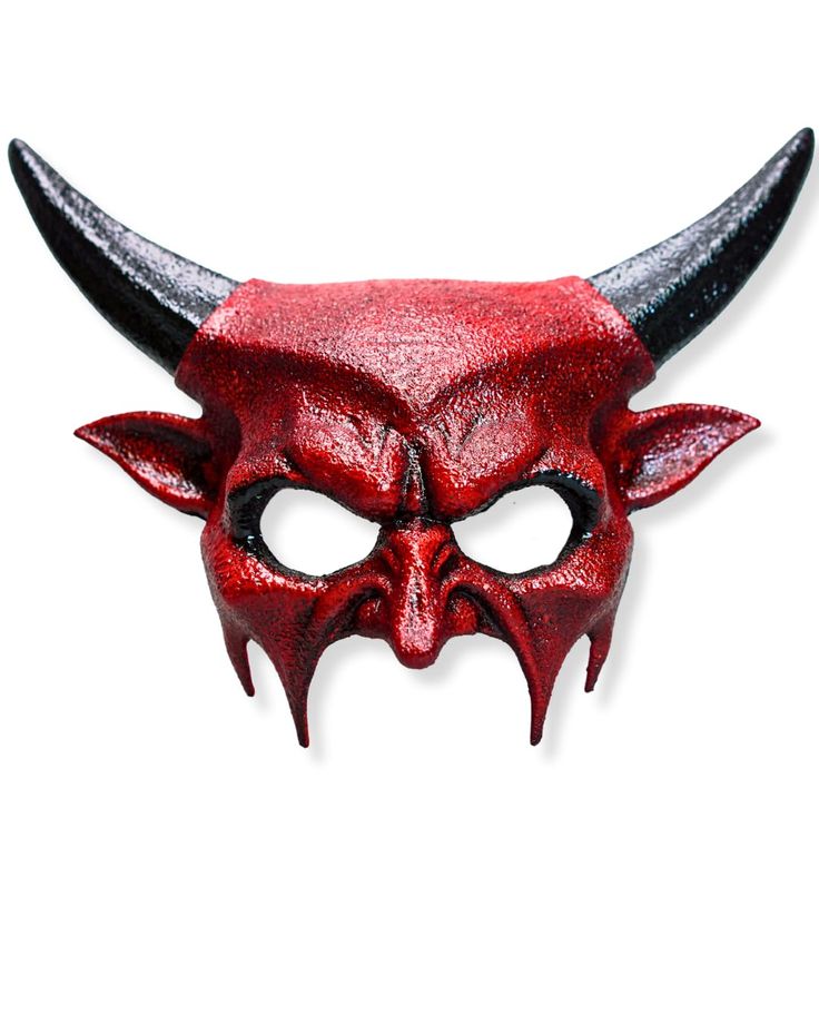 a red mask with black horns on it