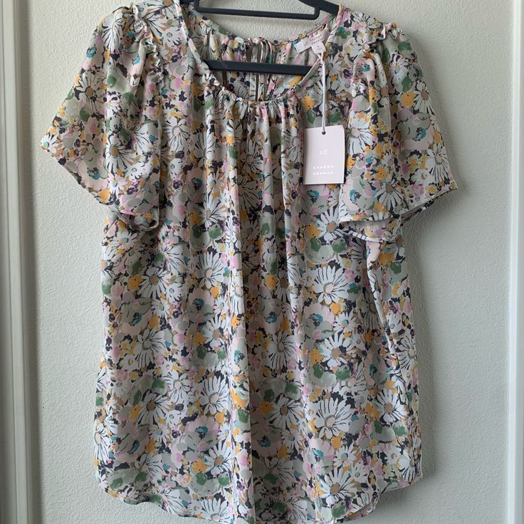 Lauren Conrad Floral Blouse. Brand New Condition Never Worn. Cute Pattern For Spring! Floral Print Short Sleeve Blouse For Work, Short Sleeve Blouse With Floral Print For Work, Daywear Printed Short Sleeve Blouse, Spring Daywear Multicolor Blouse, Spring Multicolor Daywear Blouse, Spring Multicolor Blouse For Daywear, Multicolor Spring Blouse For Daywear, Multicolor Short Sleeve Blouse For Daywear, Casual Floral Print Tops For Daytime